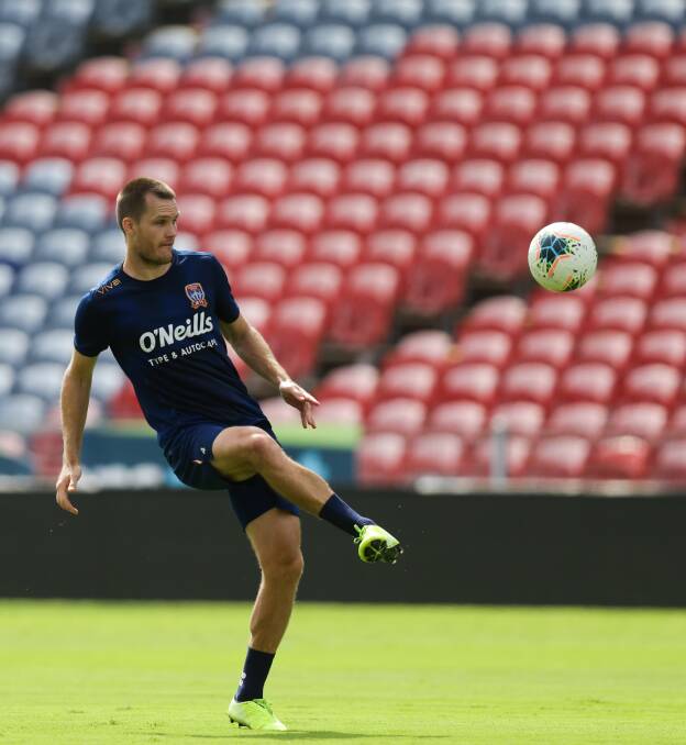UP FOR THE CHALLENGE: Skipper Nigel Boogaard will marshal the Newcastle Jets defence against a dangerous Melbourne Victory strike force. Picture: Jonathan Carroll