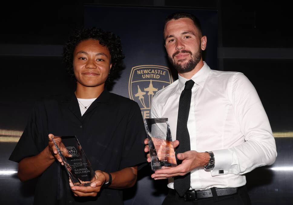 Sarina Bolden and Apostolos Stamatelopoulos with their play of the year awards at the Jets'presentation night at Modus Merewether. Picture by Peter Lorimer.