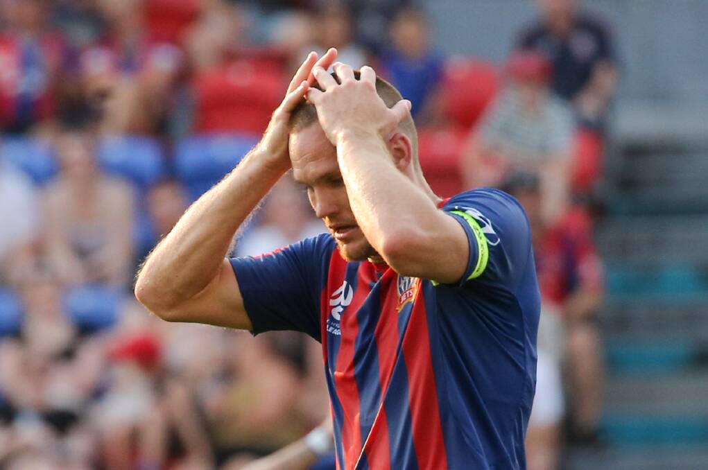 FRUSTRATED: Newcastle Jets captain Nigel Boogaard wants some answers. Picture: Max Mason-Hubers