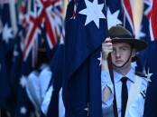 Participants prepare for the Anzac Day march in Sydney. Picture by Dean Lewins