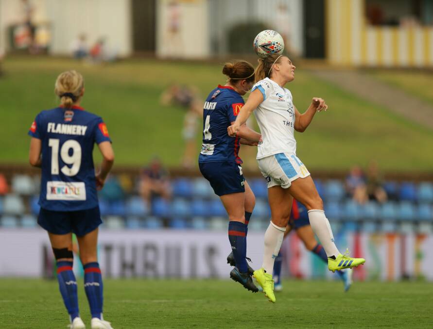 IMPACT: Annabel Martin, left, contests the ball in her first appearance for the Newcastle Jets against Sydney at McDonald Jones Stadium on Sunday. Picture: Jonathan Carroll