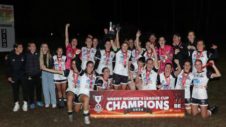 Maitland celebrate their League Cup victory at Cooks Square Park on Sunday night. Picture by Michael Ying Sing/NNSWF