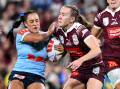 Newcastle duo Yasmin Clydsdale, left, and Tamika Upton, right, at Suncorp Stadium on Thursday night. Picture Getty Images