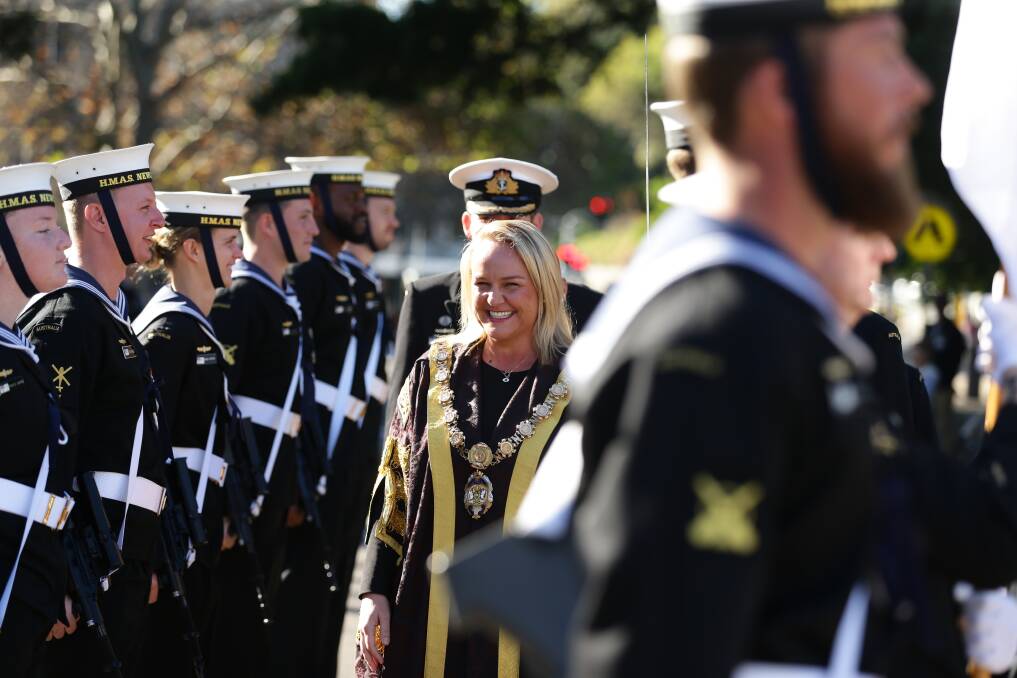 Lord Mayor of Newcastle Nuatali Nelmes inspects the company of the warship HMAS Newcastle in 2019.