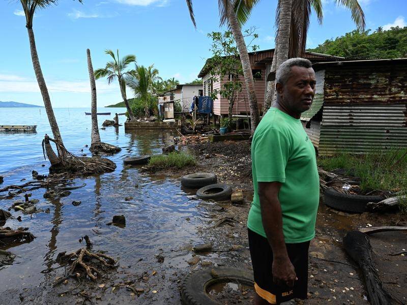 Fijian Tuiverata says the seawall has failed to stop the water from forcing the relocation of houses (Mick Tsikas/AAP PHOTOS)