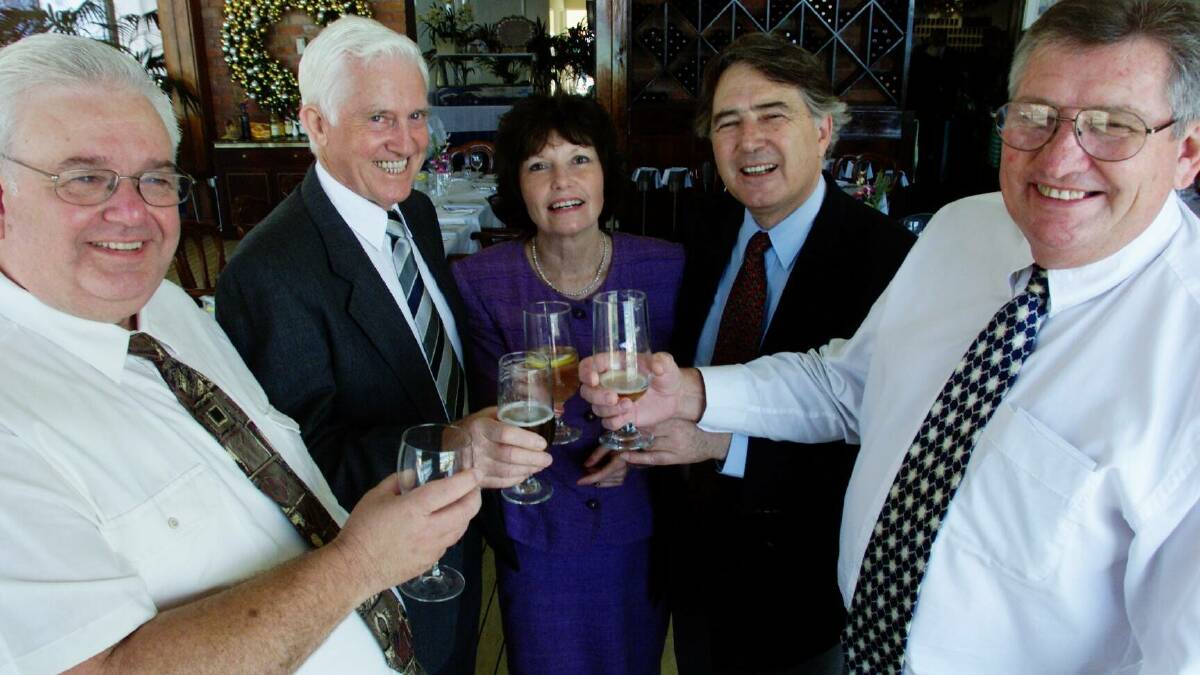 Mr Mason with other Hunter cinema stalwarts Keith Turnbull, Margaret and Theo Goumas and Andrew Halkett pictured in 2000 toasting Mr Turnbull's retirement from Tower Cinemas.