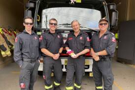 Leading firefighter Adam Reeson, qualified firefighter Stephen Edgar, firefighter Roberto Gnecchi-Ruscone and station officer Dennis Cornell went to a Bundanoon hotel to help a woman deliver her baby three weeks earlier than expected. Picture supplied 
