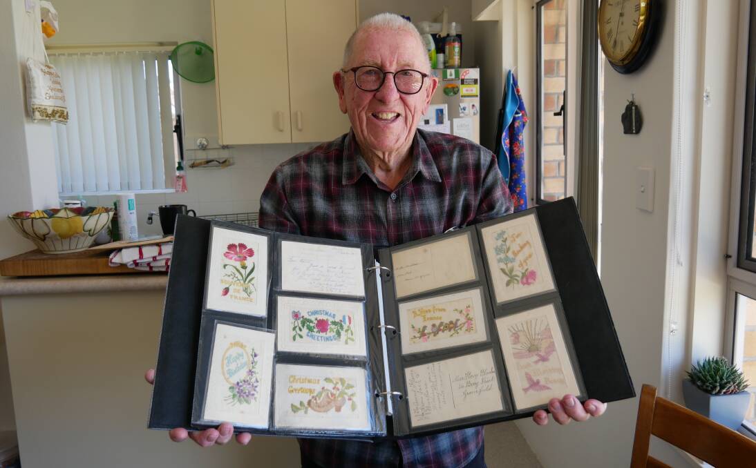 Merimbula's William Hall is the owner of a collection of postcards from throughout modern history, including more than 300 original postcards from World War I. Picture by Ellouise Bailey 
