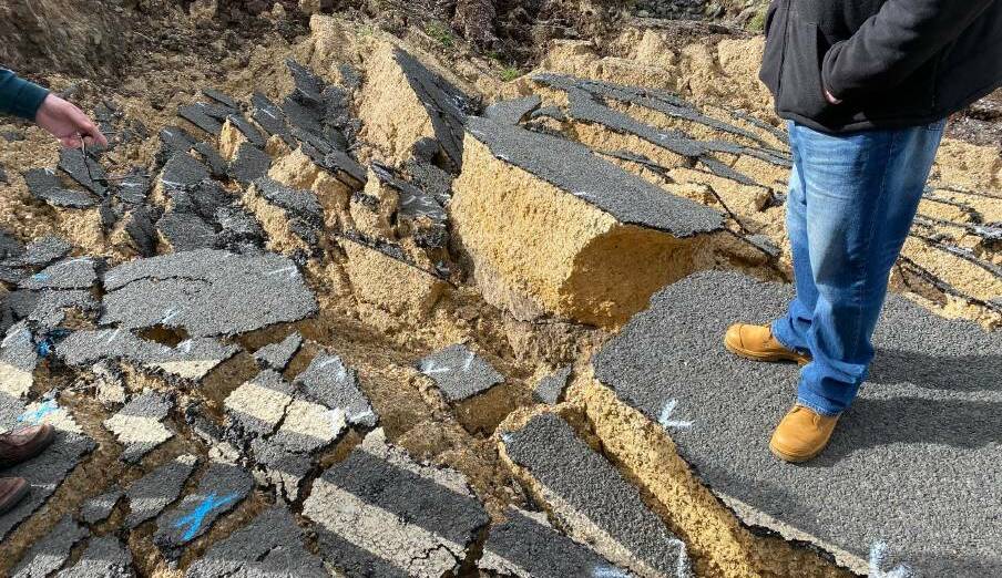 Upper Hunter Shire Council general manager Greg McDonald stands near deep cracks in the roadway on Merriwa Road. Picture supplied.