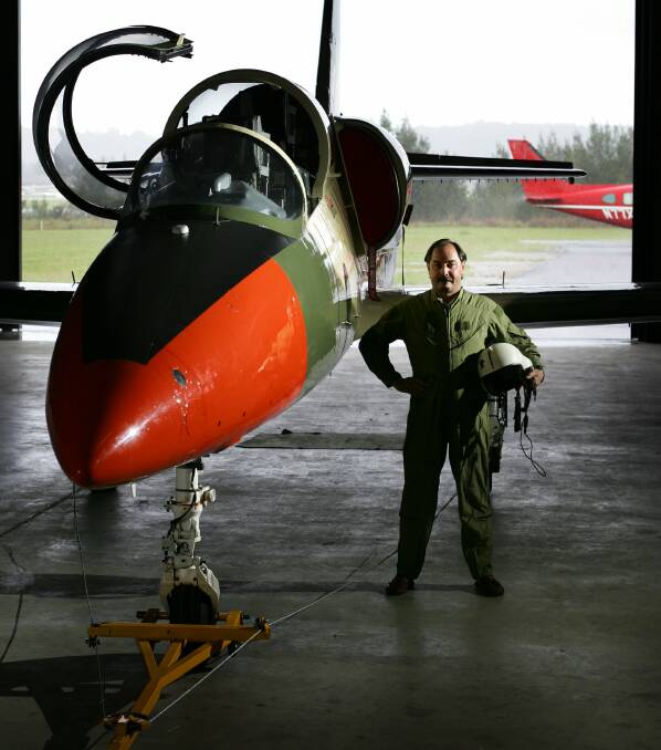 Phil Unicomb pictured with his L-39 Albatros (Lead in Jet Fighter) at Cessnock Airport in November, 2005. Picture by Peter Stoop