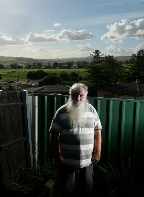 MT UNPLEASANT: Muswellbrook resident Pete Kennedy in his backyard from where MACH Energy's Mt Pleasant coal mine, which Mr Kennedy dubs 'Mt Un-Pleasant' can be seen over his back fence. If approved, expansion plans for the mine will double its yield and extend its life by 22 years. Picture: Jonathan Carroll