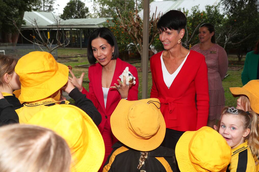 NSW Minister for Family and Communities and Port Stephens MP Kate Washington (right), pictured with Deputy Premier and Minister for Education Prue Car at at school in Medowie earlier this year. Picture by Peter Lorimer.