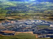 Mt Arthur Coal mine, with Muswellbrook in the background. BHP is closing the mine down, while plans to extend 15 other mines in the Upper Hunter are forging ahead.
