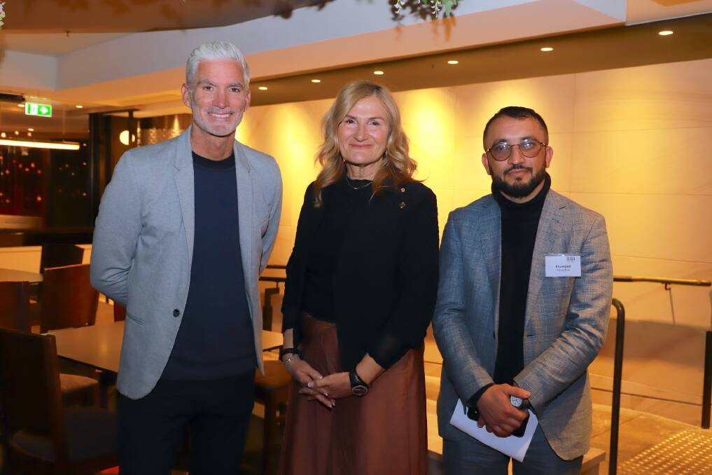 Human rights activist and former Socceroo Craig Foster, SSI CEO Violet Roumeliotis, and former head coach of the Afghanistan Girls Premier League Khorsand Yousofzai at Belmore. Picture: Damon Amb