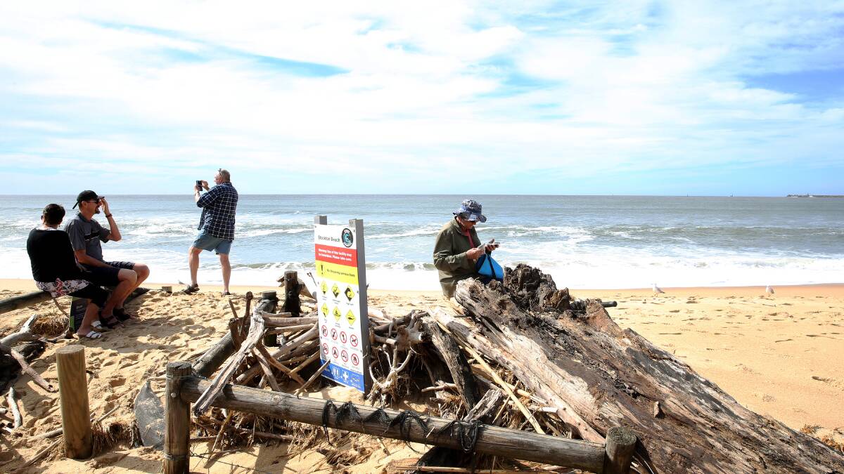 Giant swells smash Stockton and wreak widespread havoc at Hunter beaches