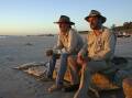 ON A MISSION: Tim Flannery pictured with John Doyle, aka Rampaging Roy Slaven, with whom he filmed a six-part series exploring Australia through a climate change lens, journeying from Cairns to Broome. Picture: Supplied