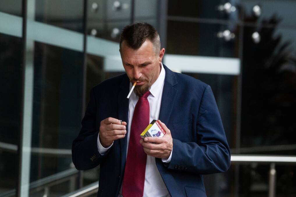 Michael Douglas Fraser, of Seaham, takes a break outside Newcastle District Court where he is being sentenced over firearms offences.