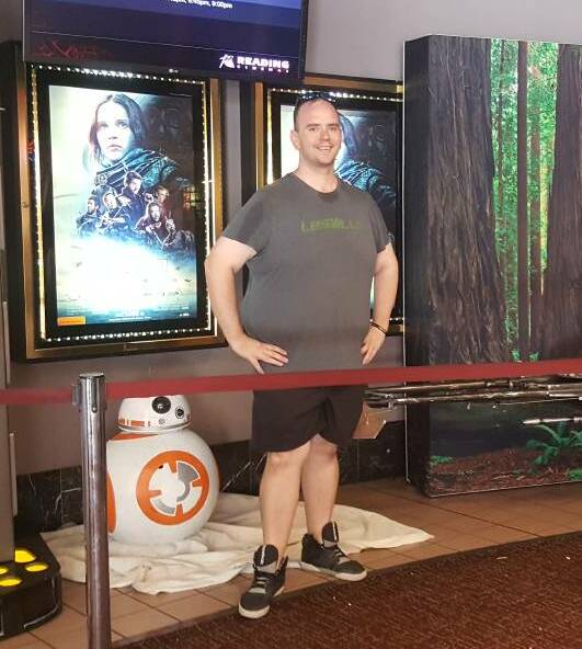 Mackael 'Mack' Stockhausen, with a display of his Star Wars collectables at Maitland Reading Cinemas, in December 2016. Picture: Simone De Peak.