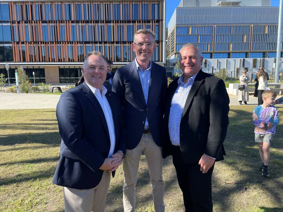 Parliamentary Secretary for the Central Coast Adam Crouch alongside Premier Dominic Perrottet and Vice-Chancellor Professor Alex Zelinsky in Gosford on Saturday. 