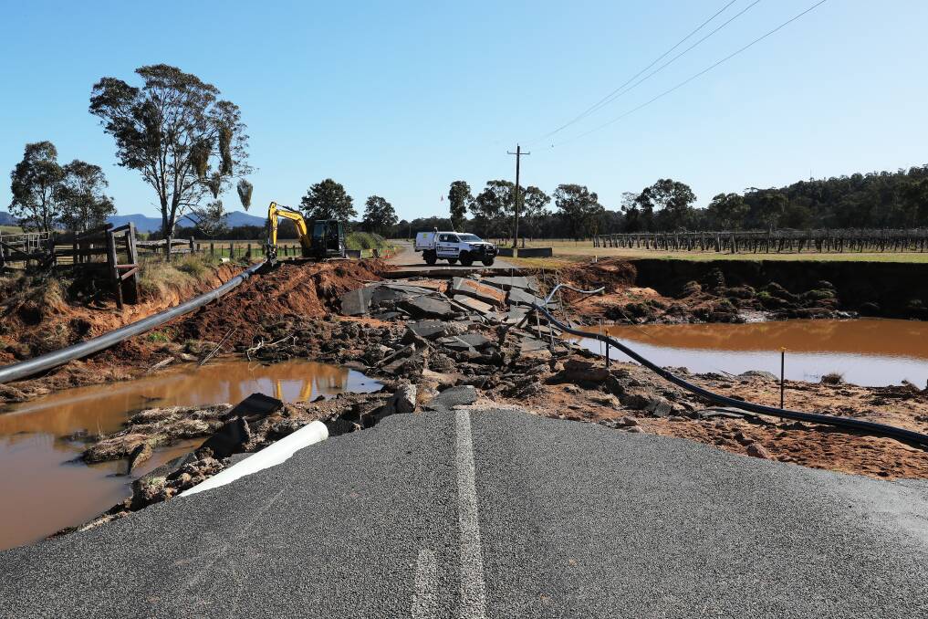 A section of Broke Road destroyed by July floods. Picture: Peter Lorimer
