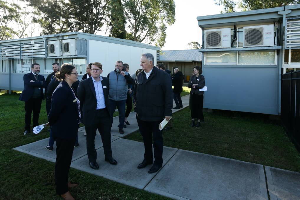 Making plans: MLC Mark Latham speaking with Gillieston Public School principal Lauren Fernando at the school on Wednesday as the parliamentary committee saw the infrastructure issues firsthand. Picture: Jonathan Carroll