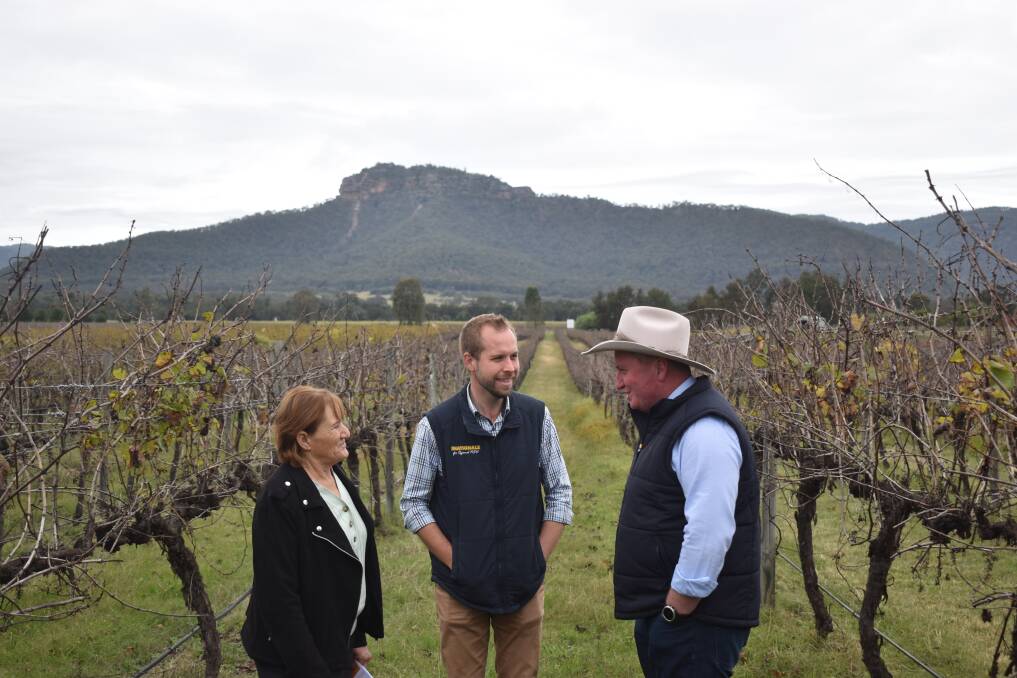 Strong supply: Singleton mayor Sue Moore with Nationals candidate James Thomson and Barnaby Joyce at Nightingale Wines on Friday. Picture: Ethan Hamilton