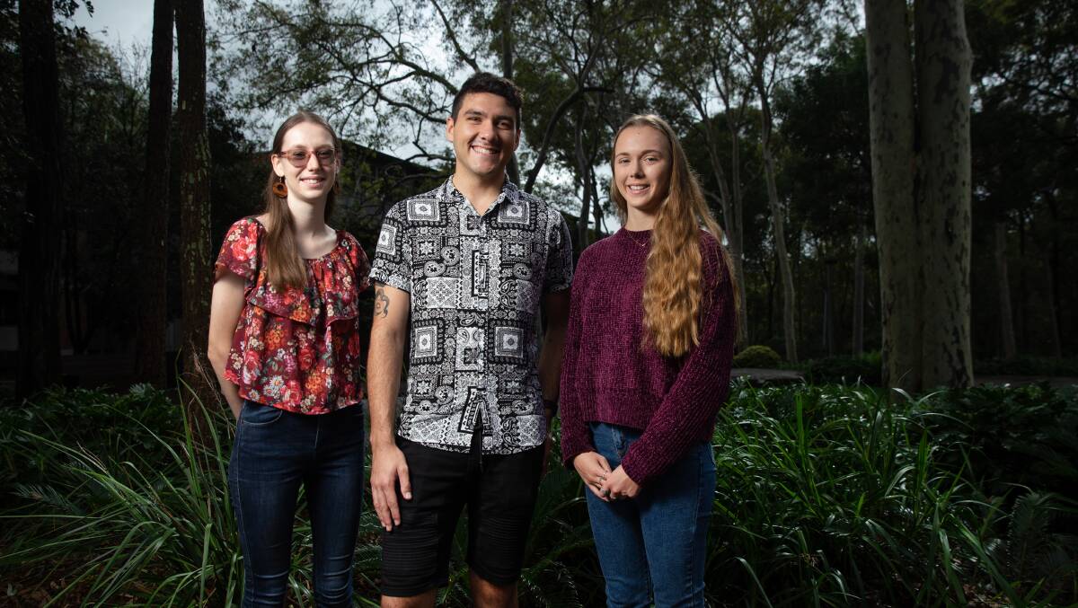 GREEN SHOOTS: Jasmine Stuart, Thomas Boehm and Jessica Haugh were part of the first cohort to enrol in the Bachelor of Renewable Energy Engineering at the University of Newcastle back in 2019. Picture: Marina Neil