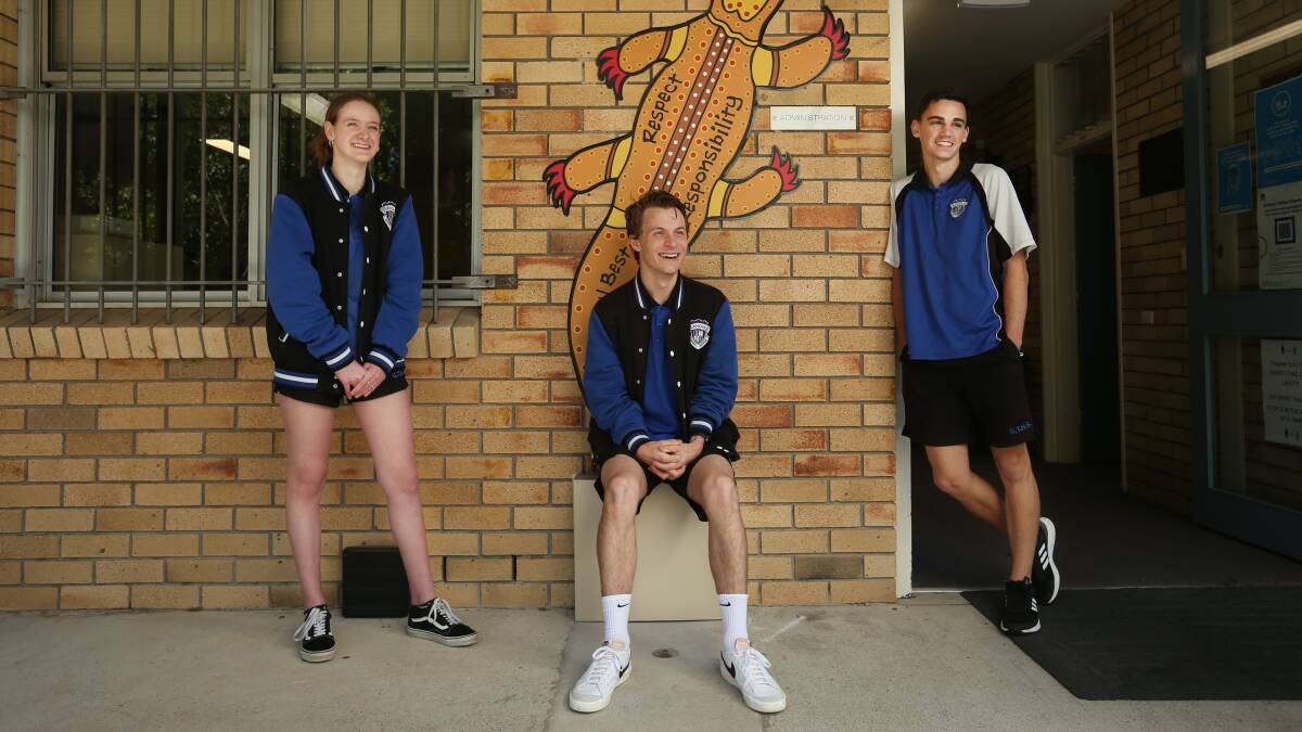 Smiling through: From left Abbey Bramley, Liam Mistelbauer and Tyler Neilsen of Glendale Technology High School after their HSC Mathematics exam. Picture: Simone De Peak 