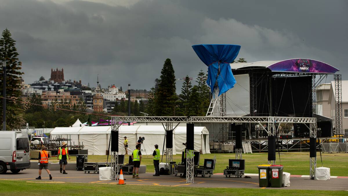 Devastated: Event staff setting up for Lunar Electric in Newcastle which was cancelled with two days notice. Picture: Marina Neil.