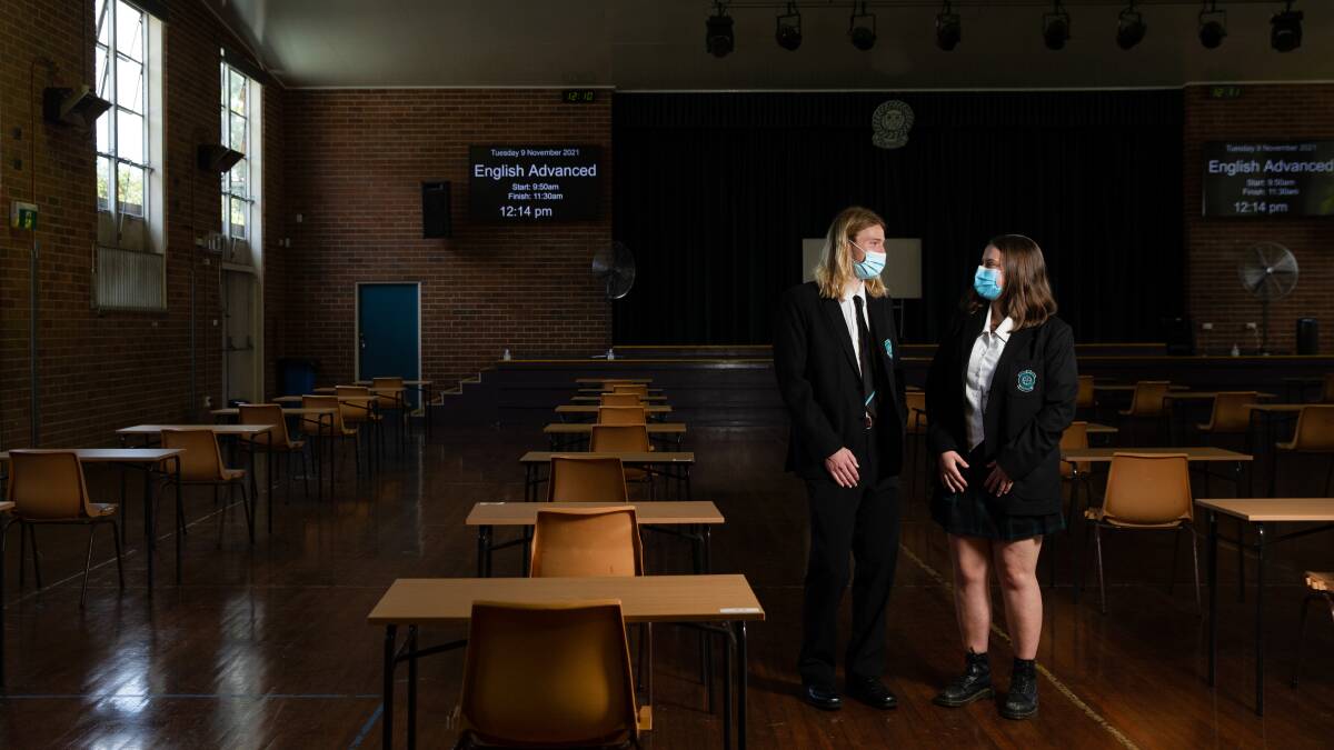 Masked up: Sam Murphy and Charlotte Cusack after their first English paper on Tuesday Picture: Marina Neil