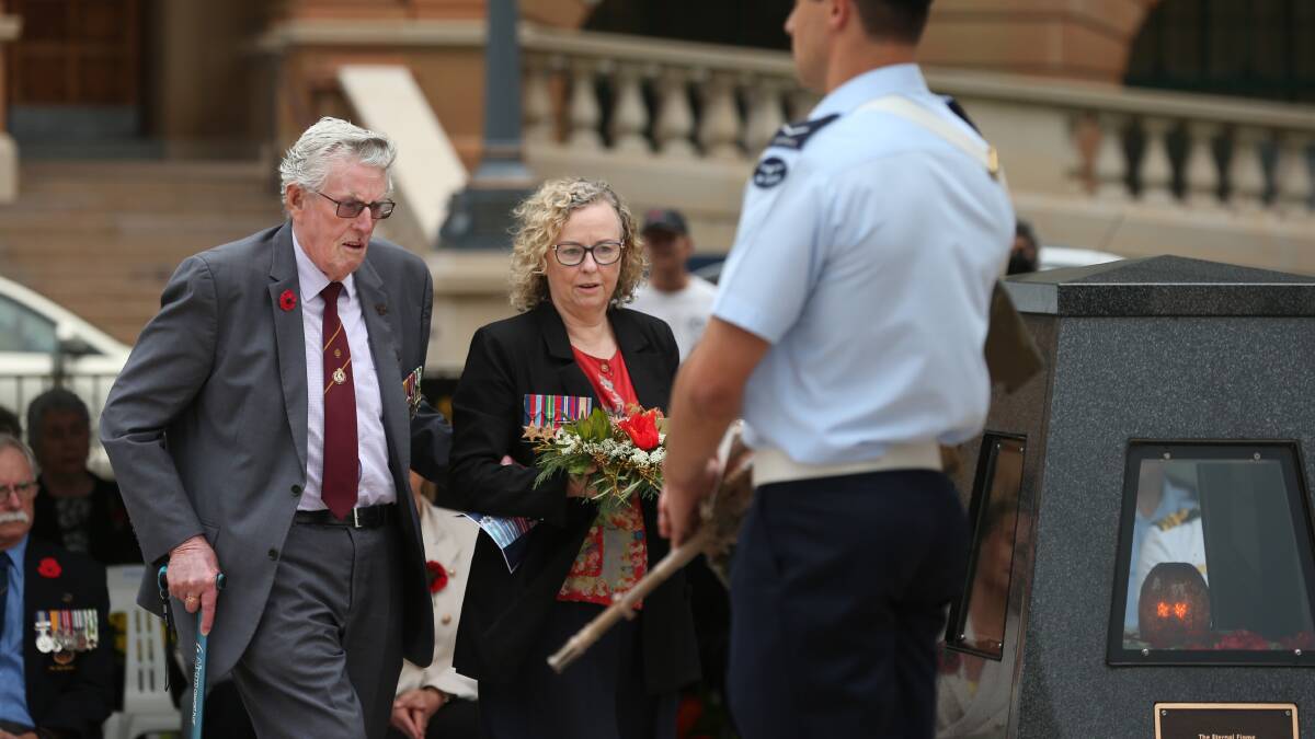 Remembering: Kevin Claydon with daughter Sharon Claydon MP laying a wreath at Civic Park Remembrance Day. Picture: Simone De Peak 