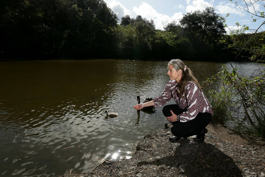 Alex Patsan and her family visit the Burwood Colliery Dam to feed the bird life weekly. Picture: Jonathan Carroll