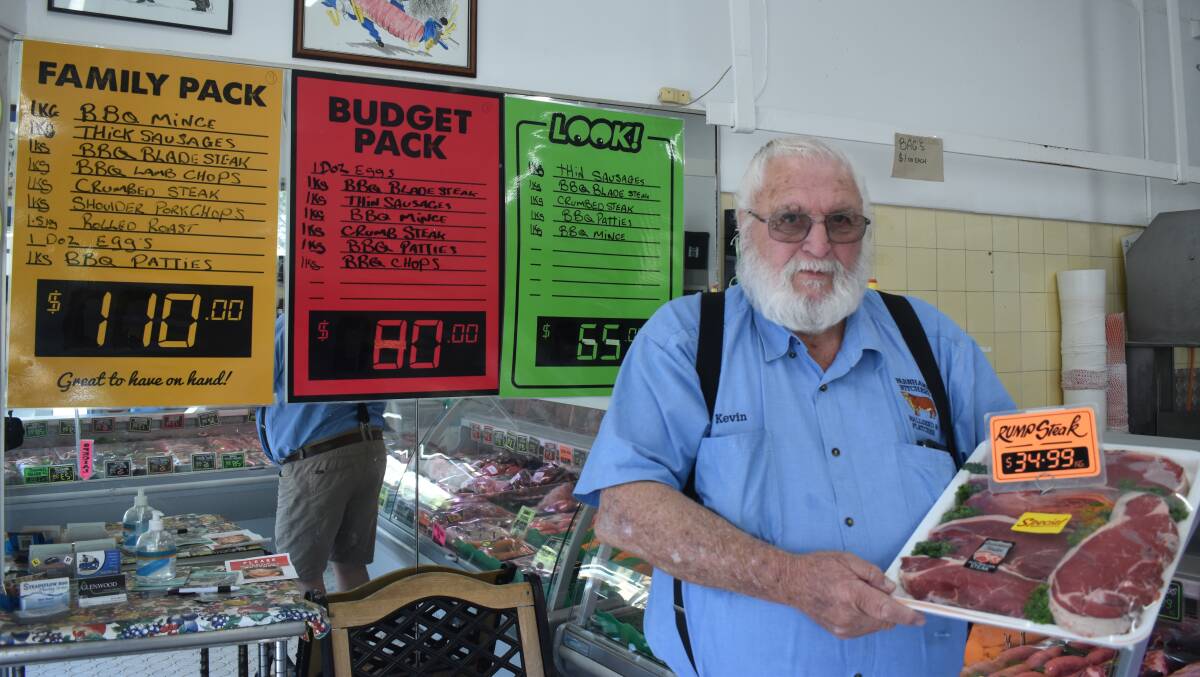Rising costs: Kevin Farnham from Farnham's Butchery in Wallsend said his business is trying to protect customers from price hikes but can't afford to continue absorbing costs if fuel prices stay high. Picture: Ethan Hamilton