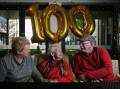 Centenarian: Marian Brunt, centre, with daughter-in-law Rae and son David, celebrated her 100th birthday on Monday. Picture: Simone De Peak