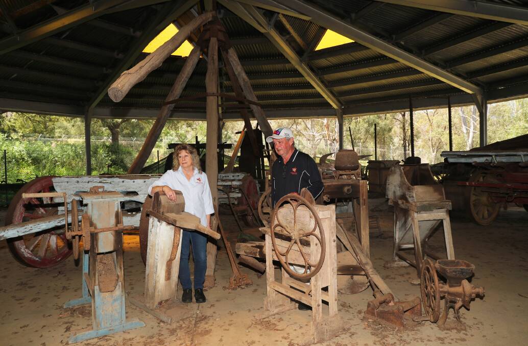 The Hunter Valley museum of Rural Life opened in 1966 and closed twenty years later, picture shows park managers Leoni and Mal Walsh with farming equipment. Picture by Peter Lorimer