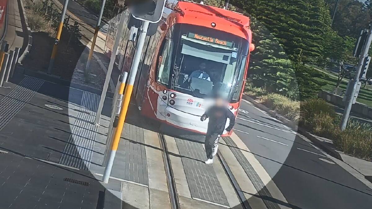 Near miss: Image from Newcastle Transport CCTV shows a near miss at Queens Wharf light rail stop. 