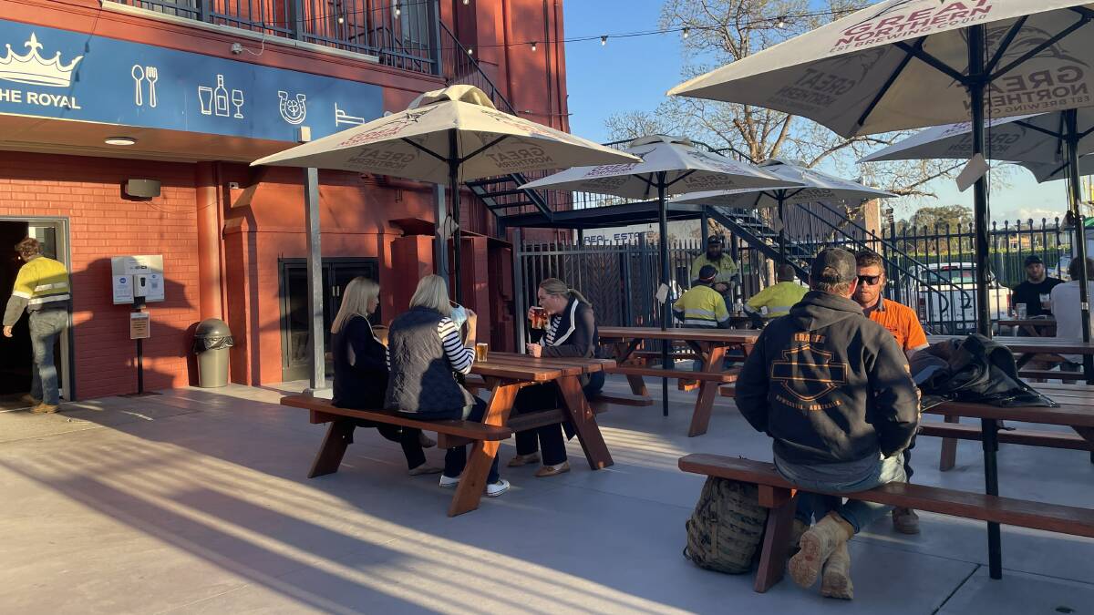 KNOCK OFF: The beer garden at the Royal Hotel began to fill soon after 5pm as residents arrived for post-work drinks. Photo: Mathew Perry