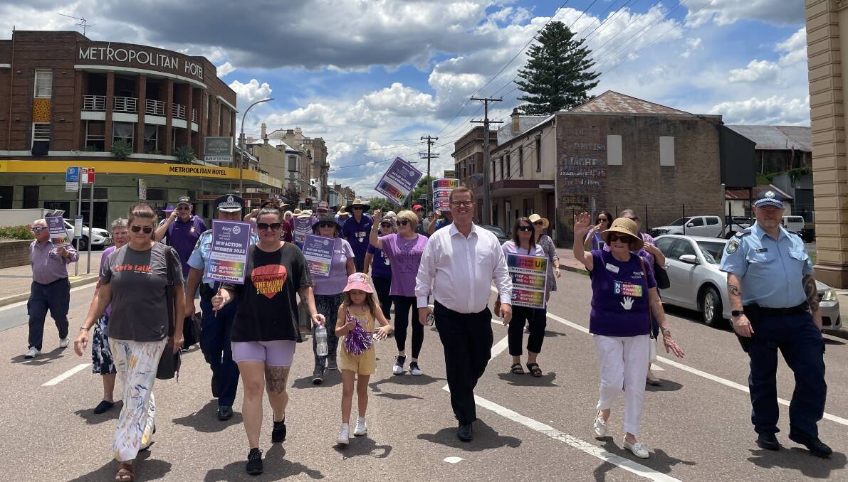 A group of people against domestic violence marched from Maitland Court House to Maitland Town Hall on Friday, December 1. Picture by Chloe Coleman