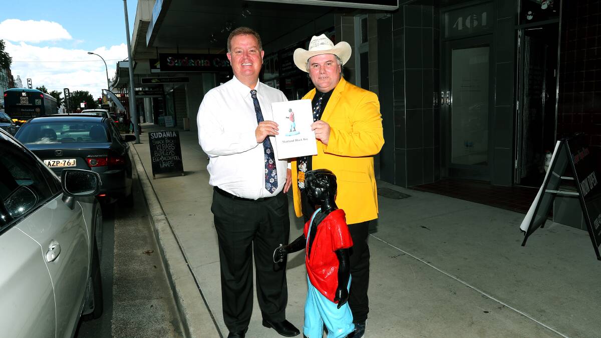 Maitland mayor Philip Penfold and historian Jack Paten with a transcript of the book. Picture by Peter Lorimer