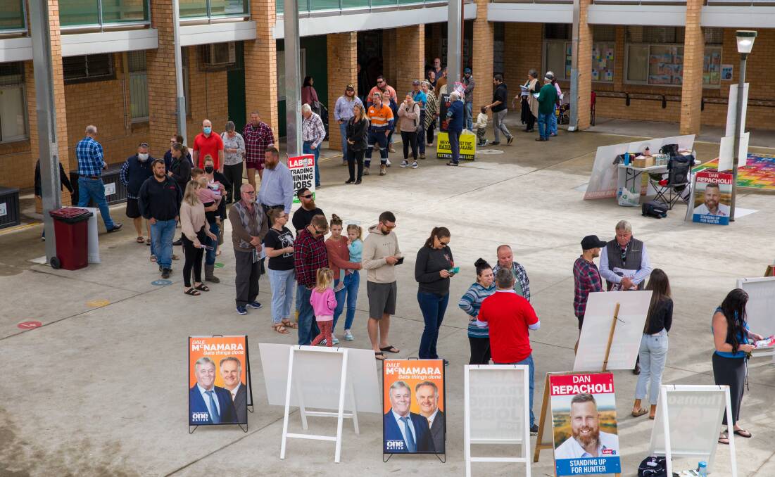 Long wait: The line to vote at Singleton Heights Public School. Picture: Max Mason-Hubers