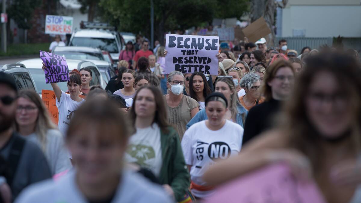 Marching: An estimated crowd of up to 1000 protesters marched from Newcastle Museum to Nobbys Beach on Tuesday to call for an end to domestic violence. Picture: Marina Neil 