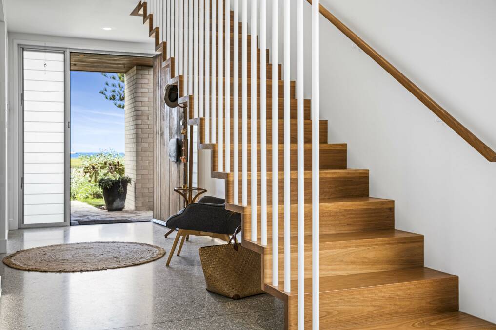 The floating staircase is one of the owner's favourite features. Picture supplied 