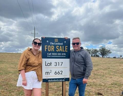Cassandra Goldsmith and Dale Baxter were second in line to buy a block of land at the launch of the new The Loxford near Maitland on Saturday. Picture supplied 