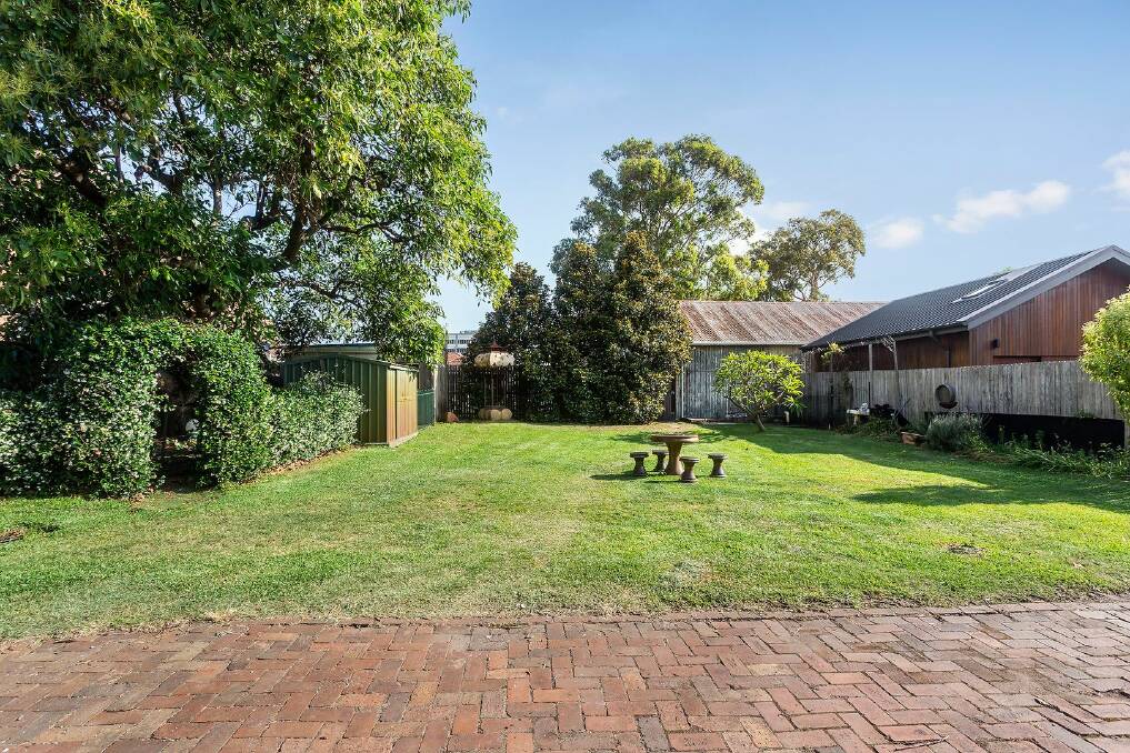 The property's large backyard includes a mature avocado tree. Picture supplied