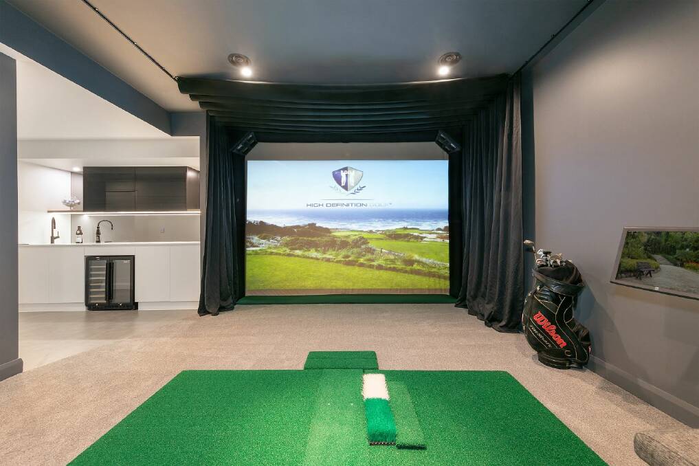 The media room has an indoor golf simulator. Picture supplied