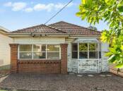 Buyers vie to snap up Newcastle's 'cheapest house' at auction