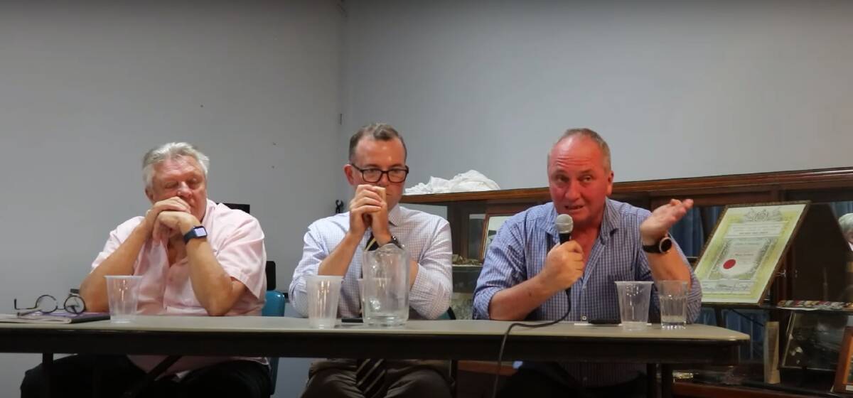 Voice for Walcha Mark Fogarty, left, Northern Tablelands MP Adam Marshall and Nationals MP Barnaby Joyce at the community meeting in Walcha to discuss the controversial Winterbourne Wind Farm. 