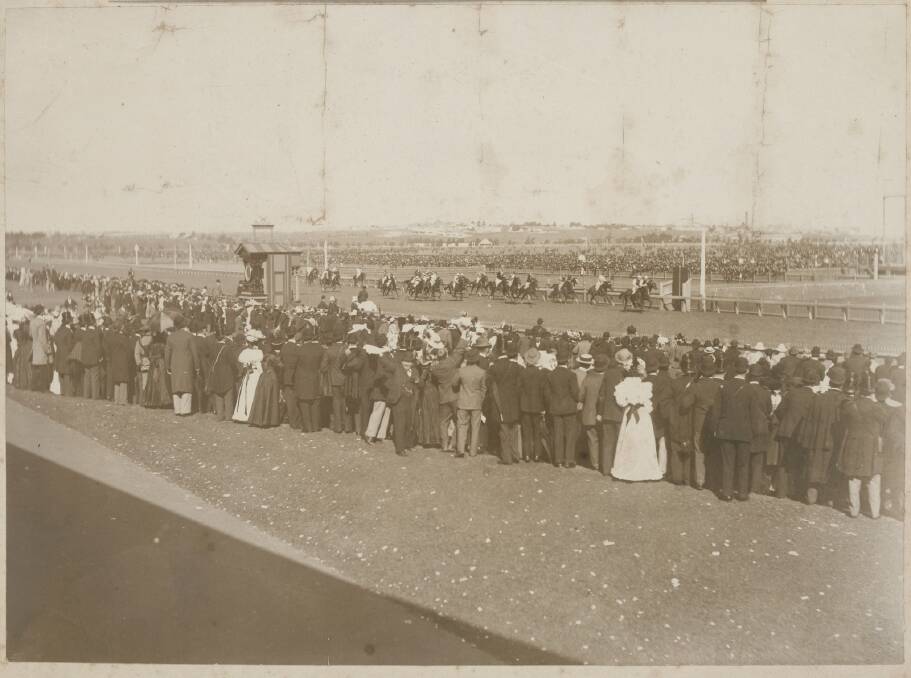 Spectators watch the Melbourne Cup finish in 1897. Picture by James Easton/State Library of Victoria