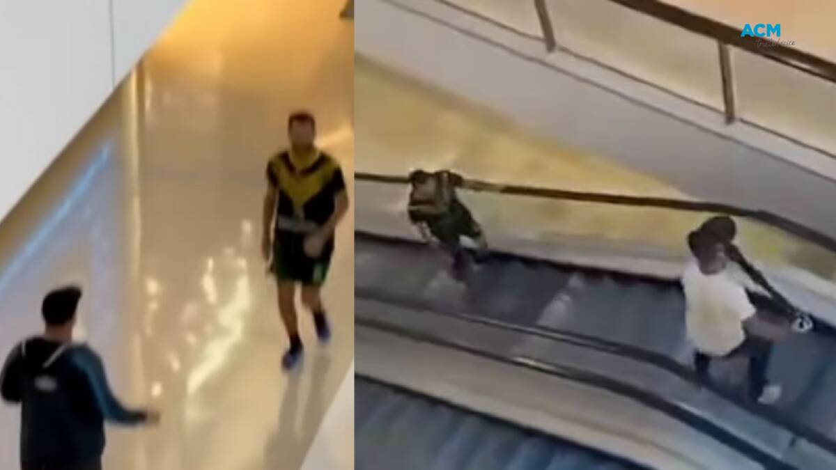 Joel Cauchi seen on CCTV footage in Westfield brandishing a knife. Pictures 7News