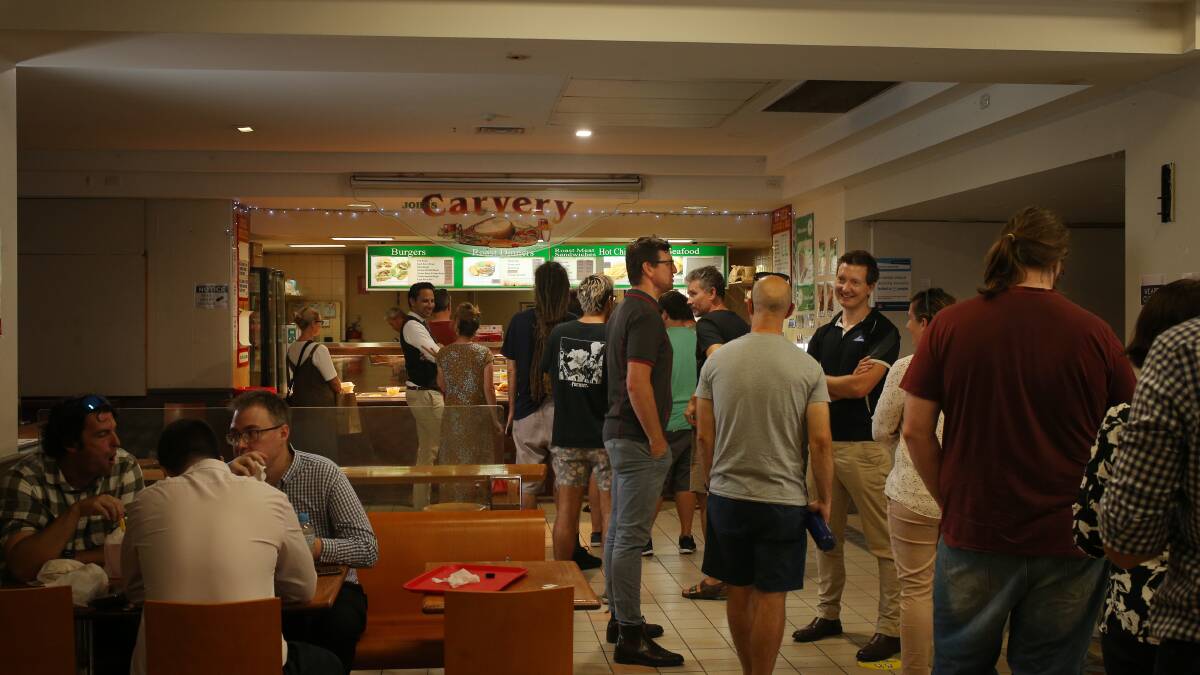 A final order: people flocked to John's Carvery for the last day of trade. Picture by Simone De Peak 